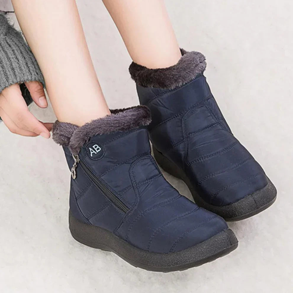 Women's waterproof warm snow boots with flat heel and side zipper