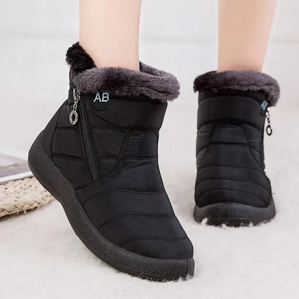 Women's waterproof warm snow boots with flat heel and side zipper